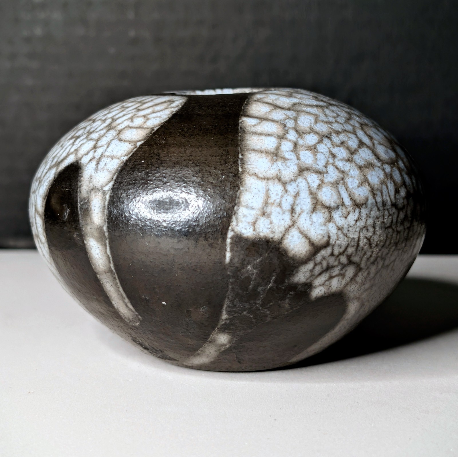 Small Naked Raku Orb “Naked Roku” Bone-White Fine-Lined Black Carbon Crackle