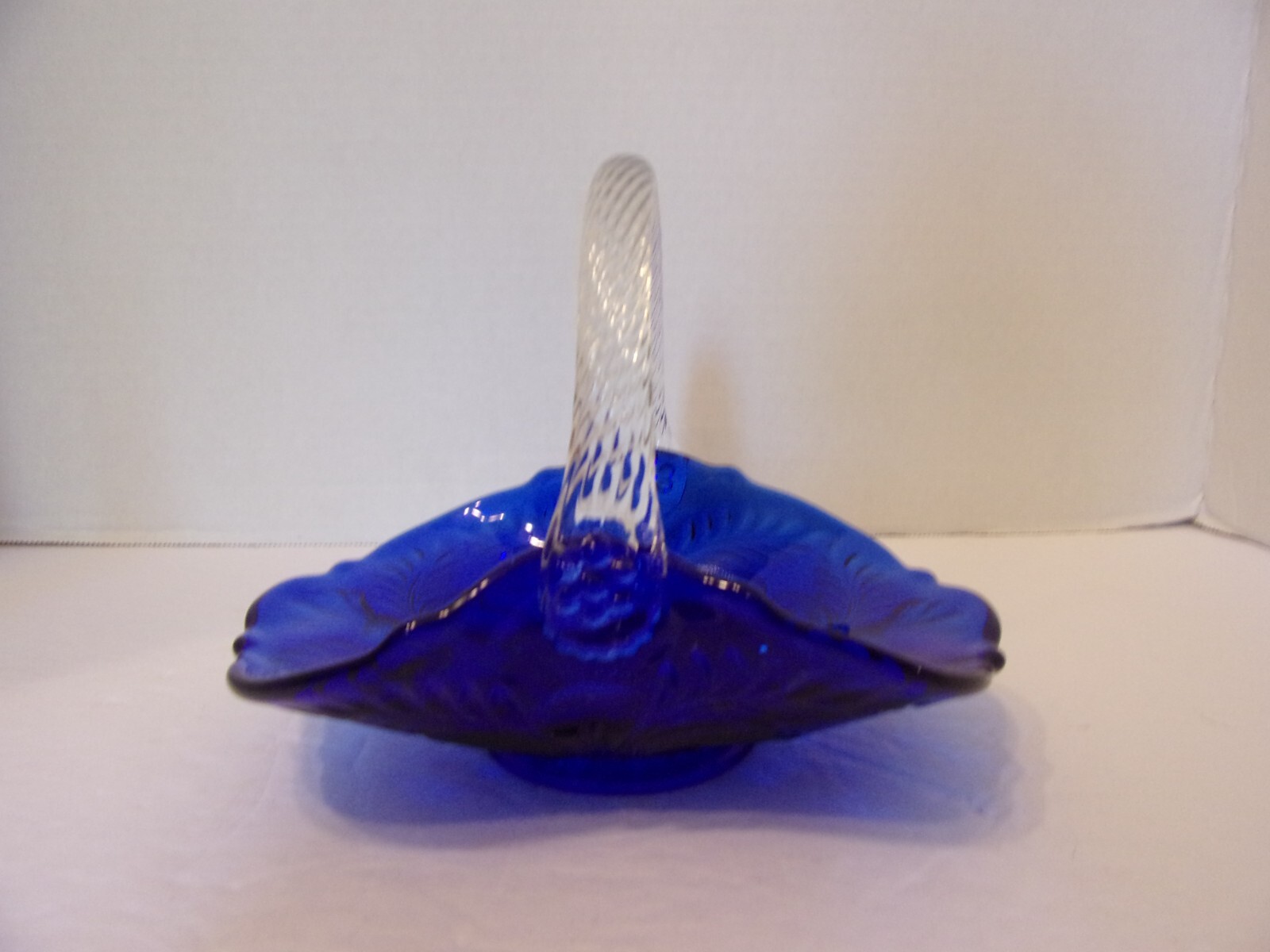 ART GLASS BLUE AND WHITE SWIRL BASKET WITH CLEAR HANDLE