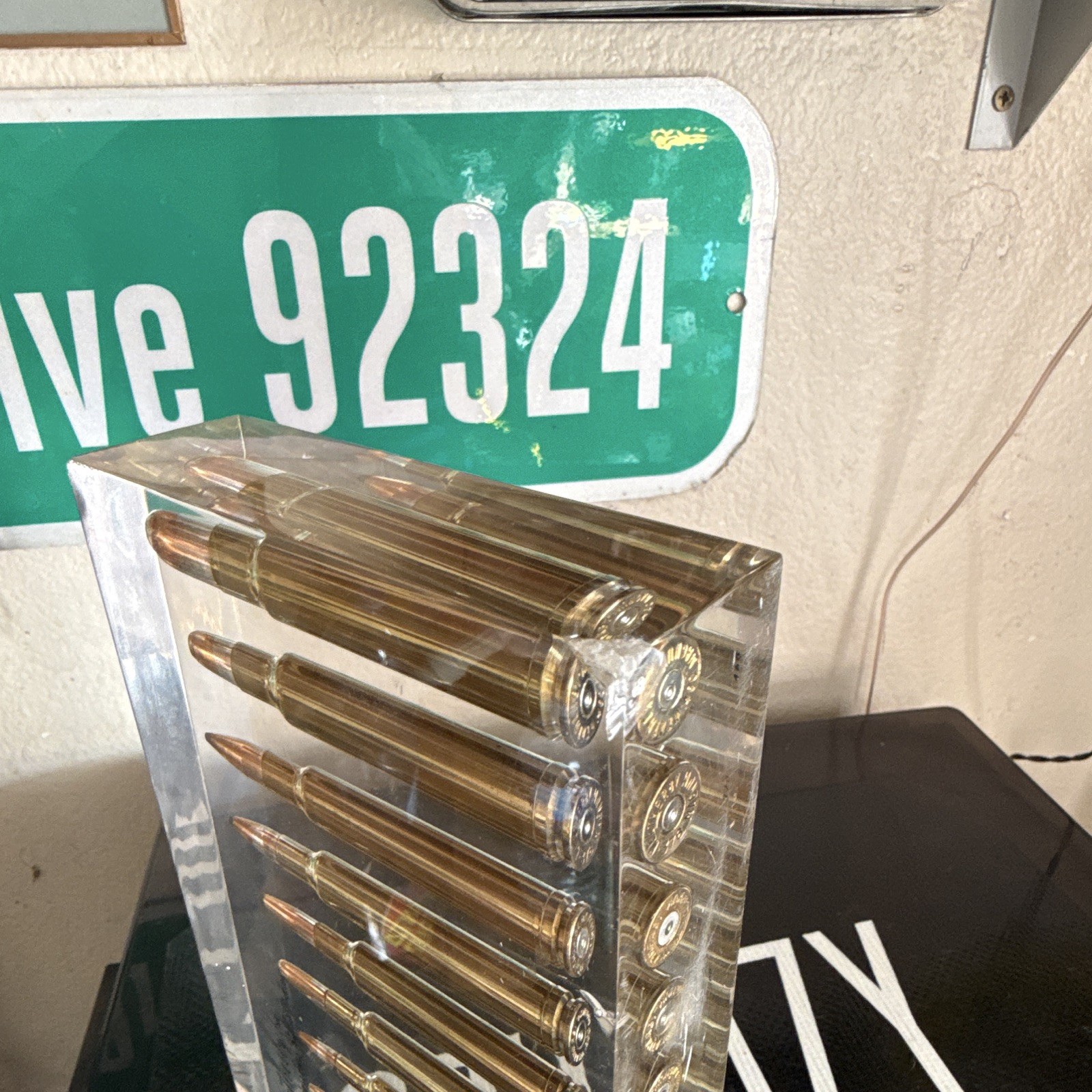 Weatherby Lucite Paperweight Clear/Gold Rifle Cartridges Display Block