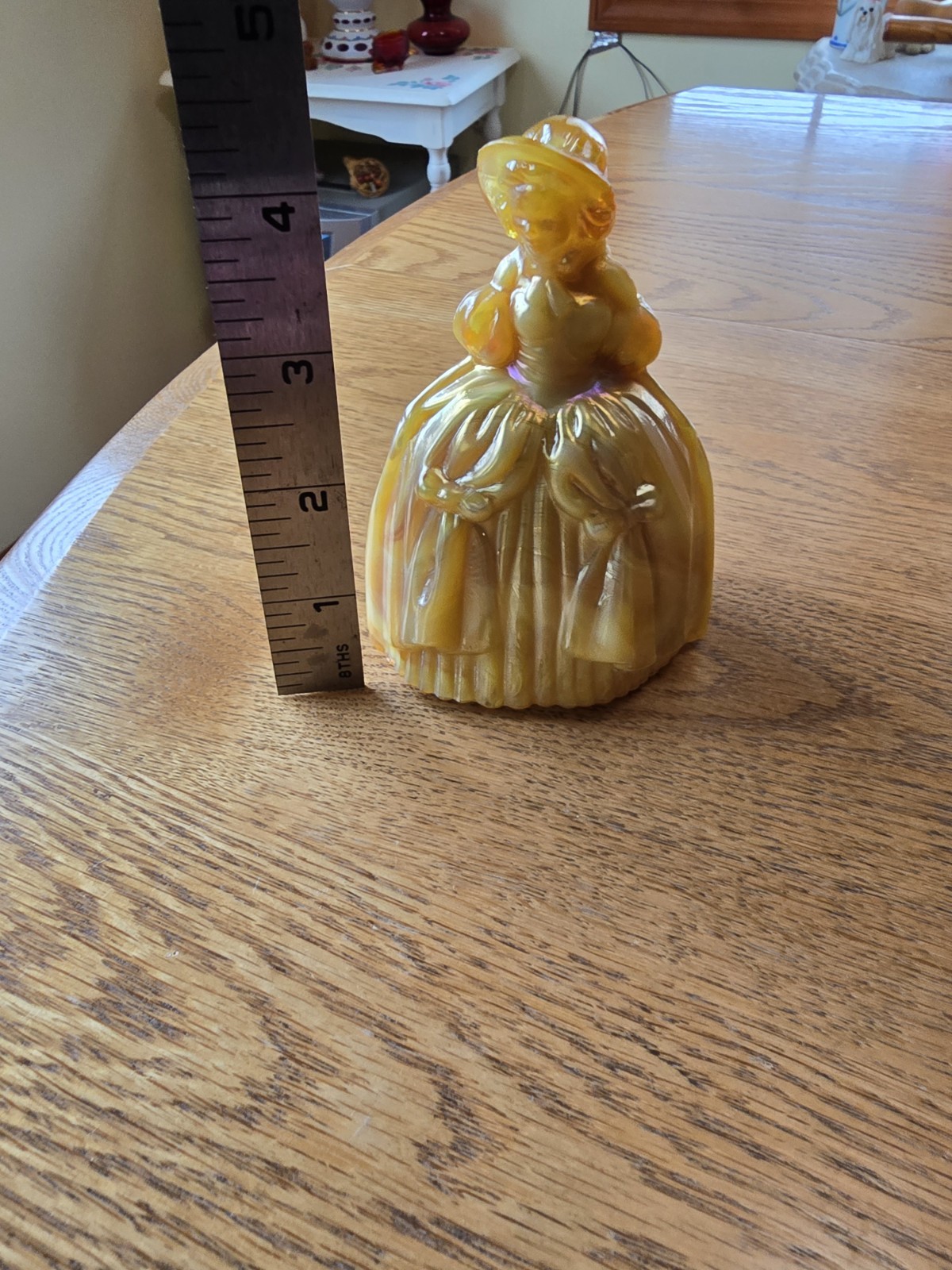 This glass figurine Is A Boyd Art Glass “Marguerite” Colonial Doll.
