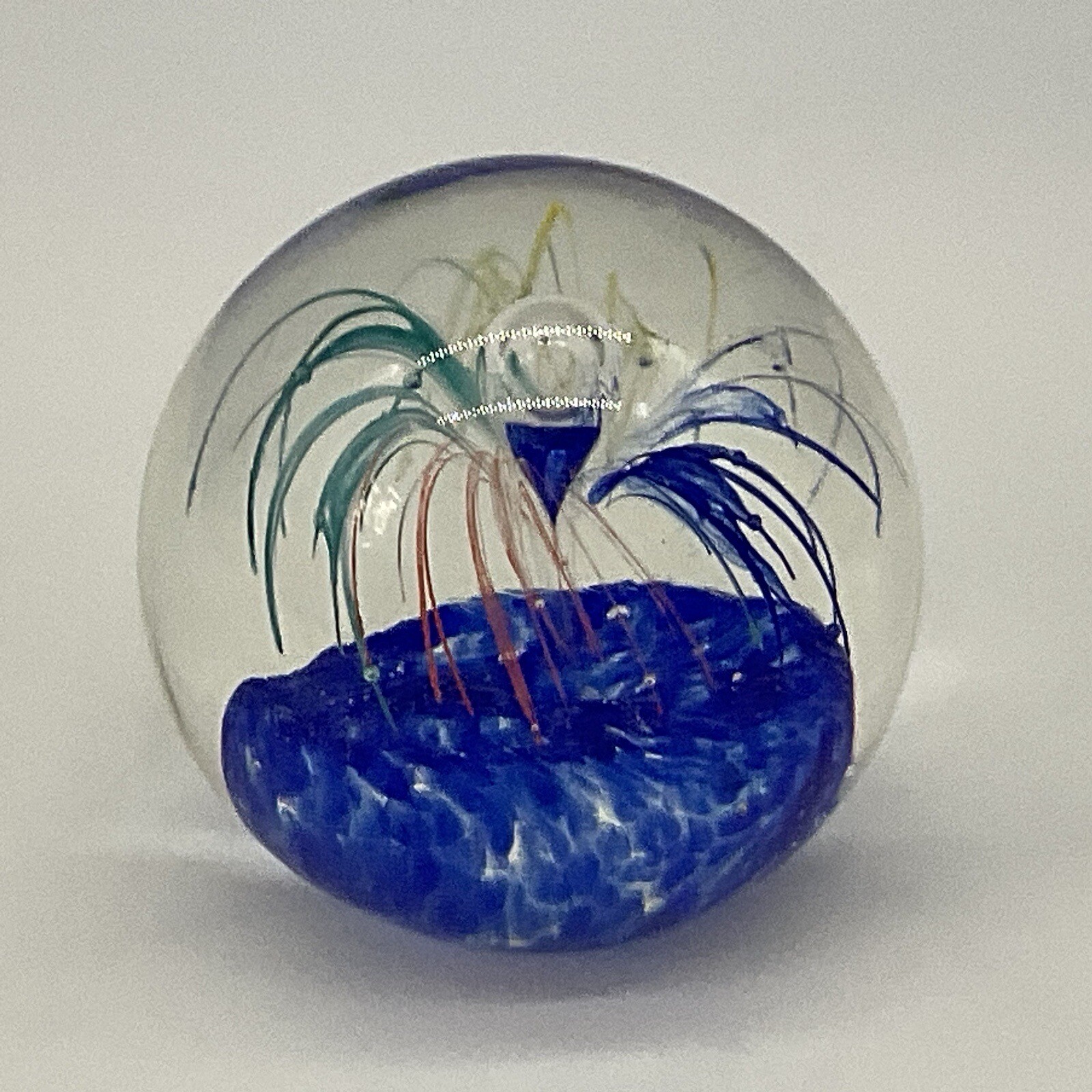 Glass Paperweight Blue Fountain With Blue, Green, Yelow And Orange 2×3