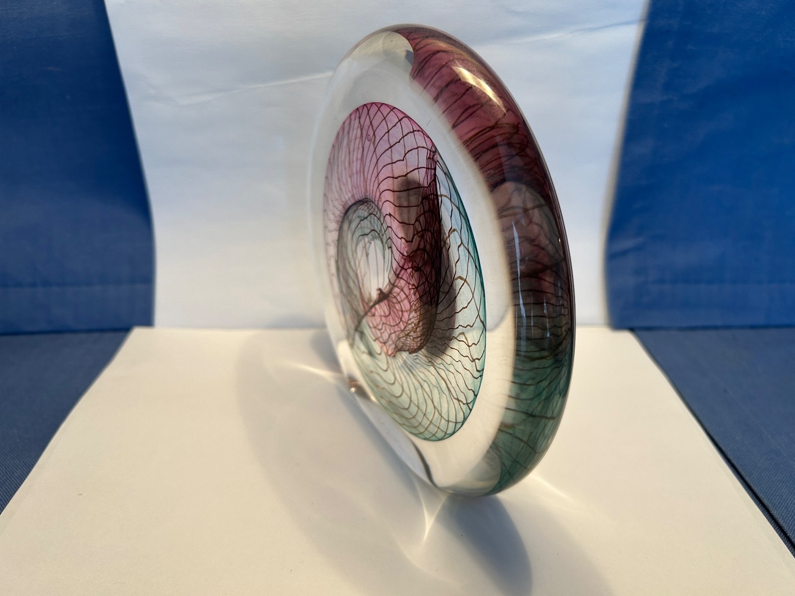 SIGNED ART GLASS FROM THE 1990S WITH PURPLE, GREENS AND LIGHT BROWN VEINING