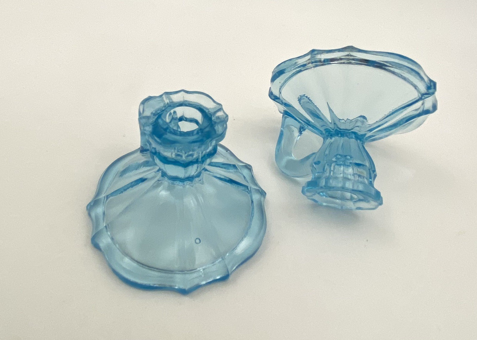 Small blue glass uranium UV glow chamber style candlestick holders