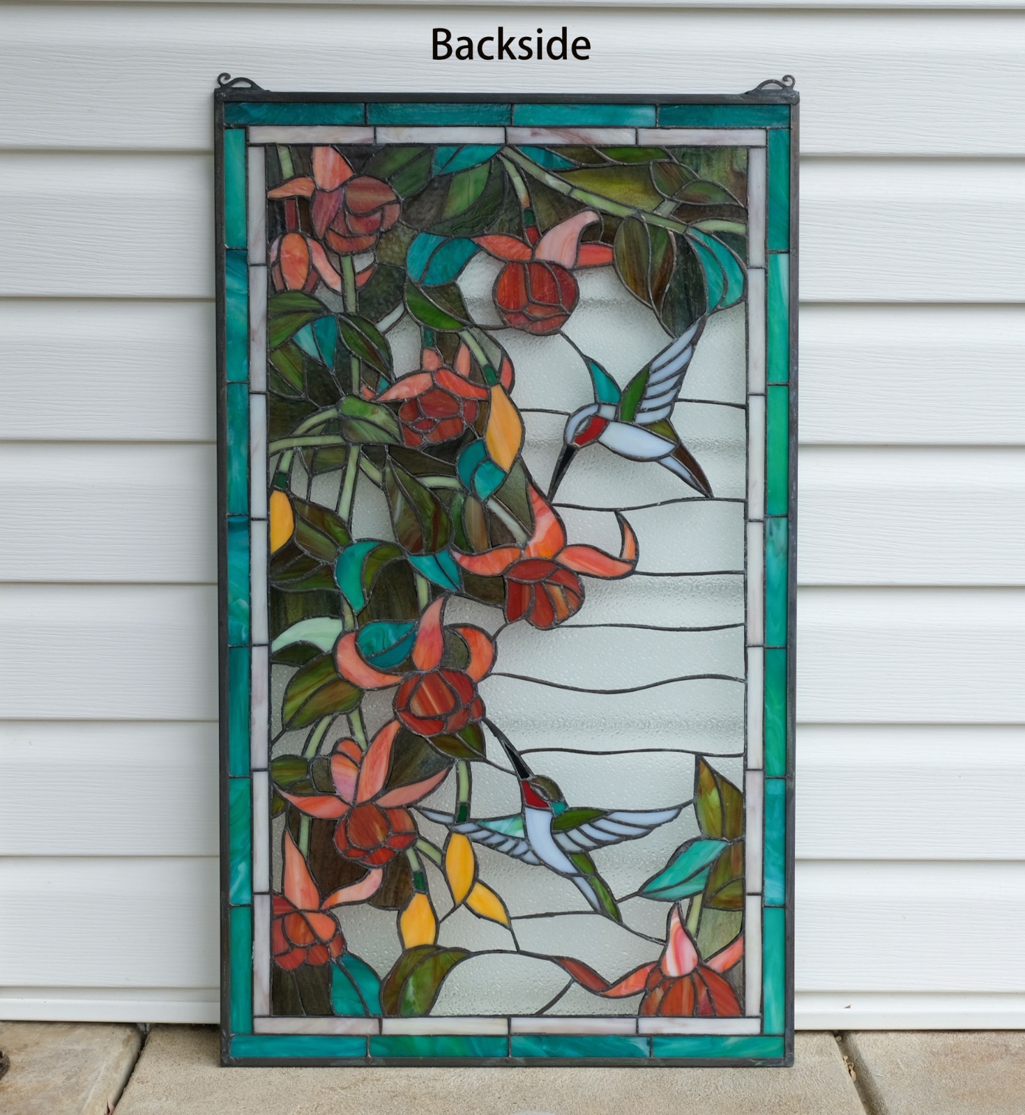 20.5″ x 34.75″ Handcrafted hummingbirds flower stained glass window panel.