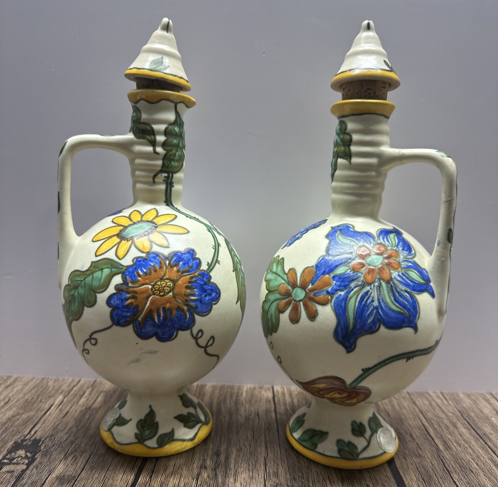 **ROYAL ZUID-HOLLAND GOUDA** VTG Pair 10.5” ‘Wilany’ Hand Painted Floral Ewers