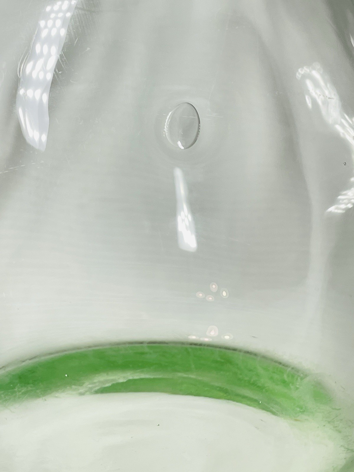 Vintage Green Uranium 12″Glass Vase Ruffled Rim faint vertical optic lines.