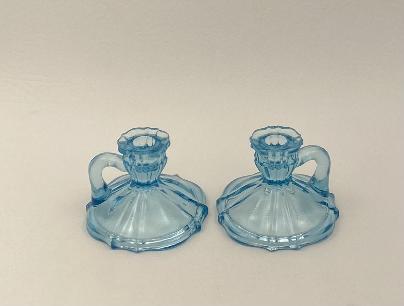 Small blue glass uranium UV glow chamber style candlestick holders