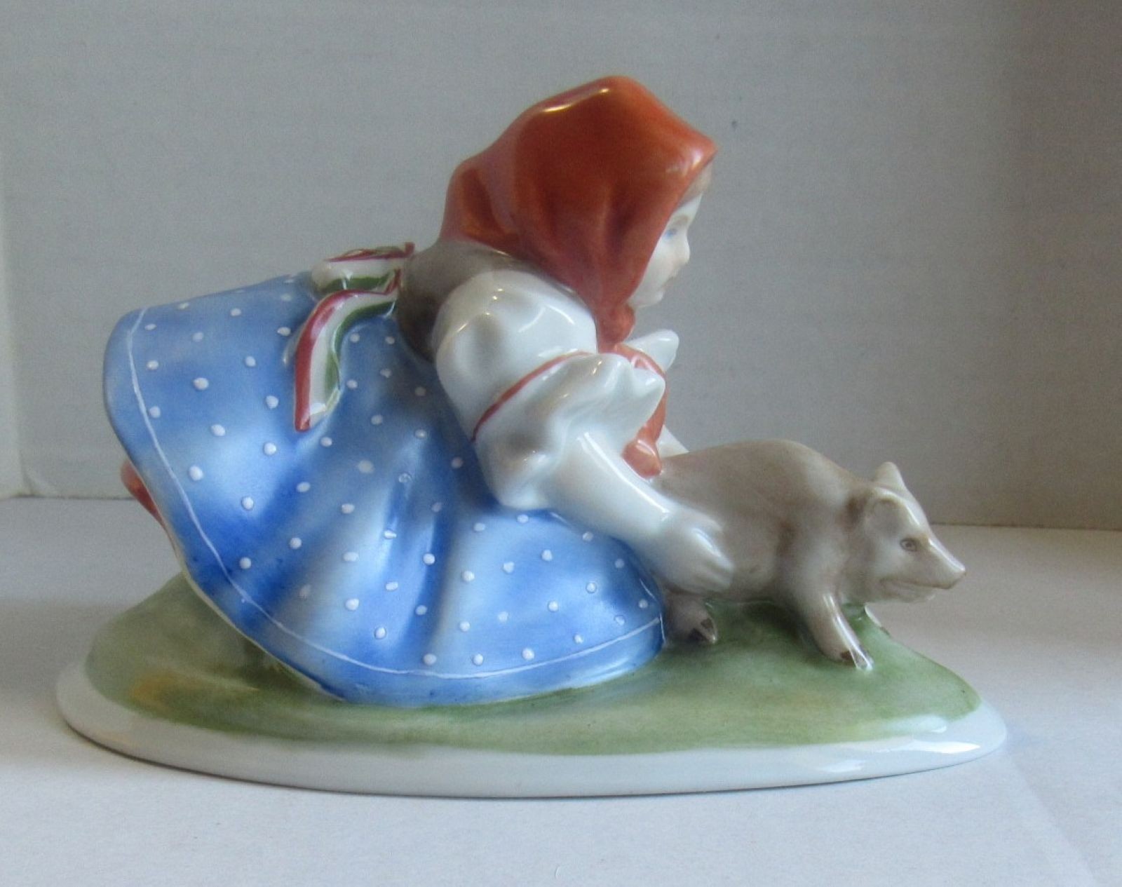 Herend Girl Chasing a Pig Figurine
