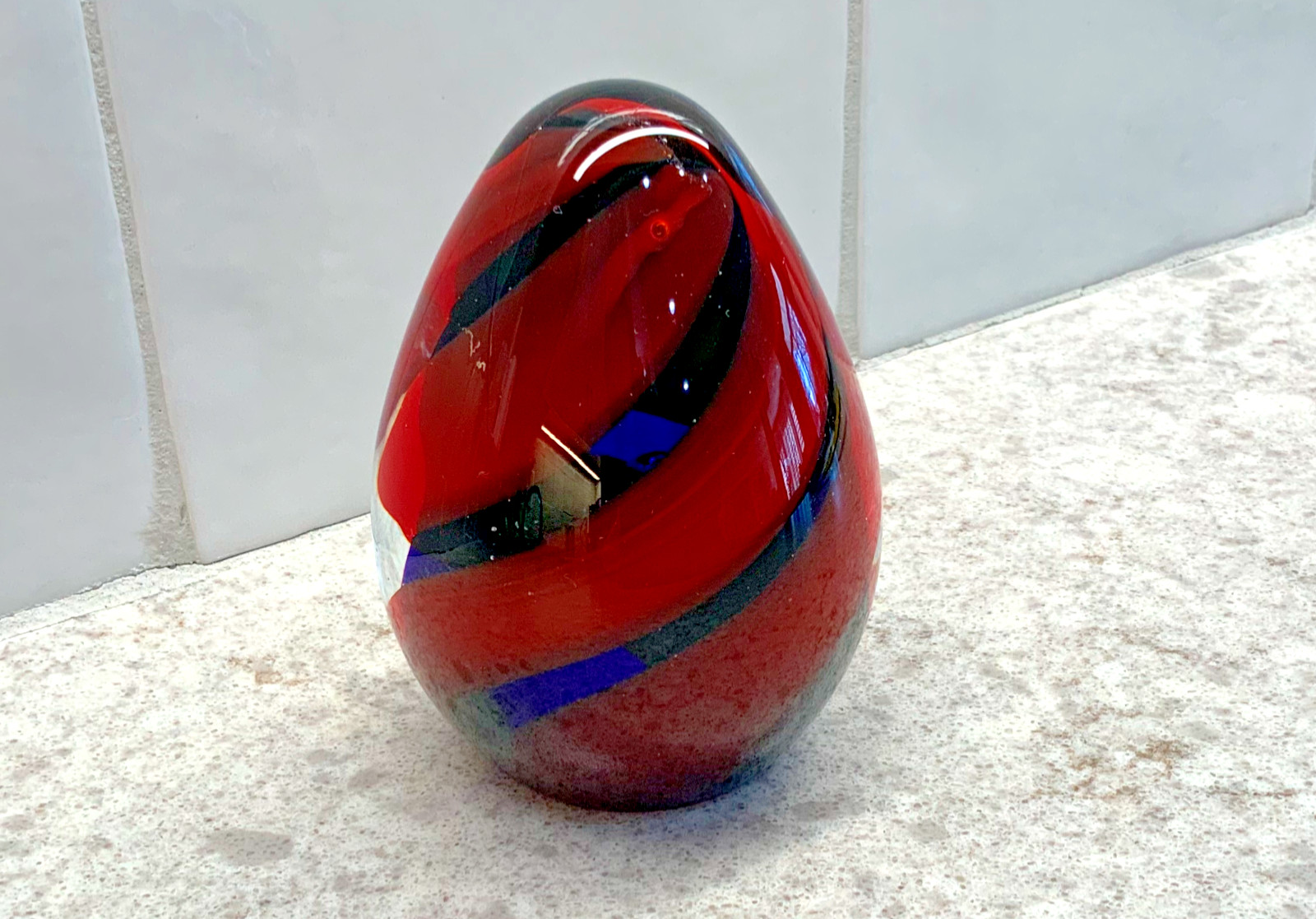 Medina Egg Shaped Paperweight Red With Black And Blue Spirals