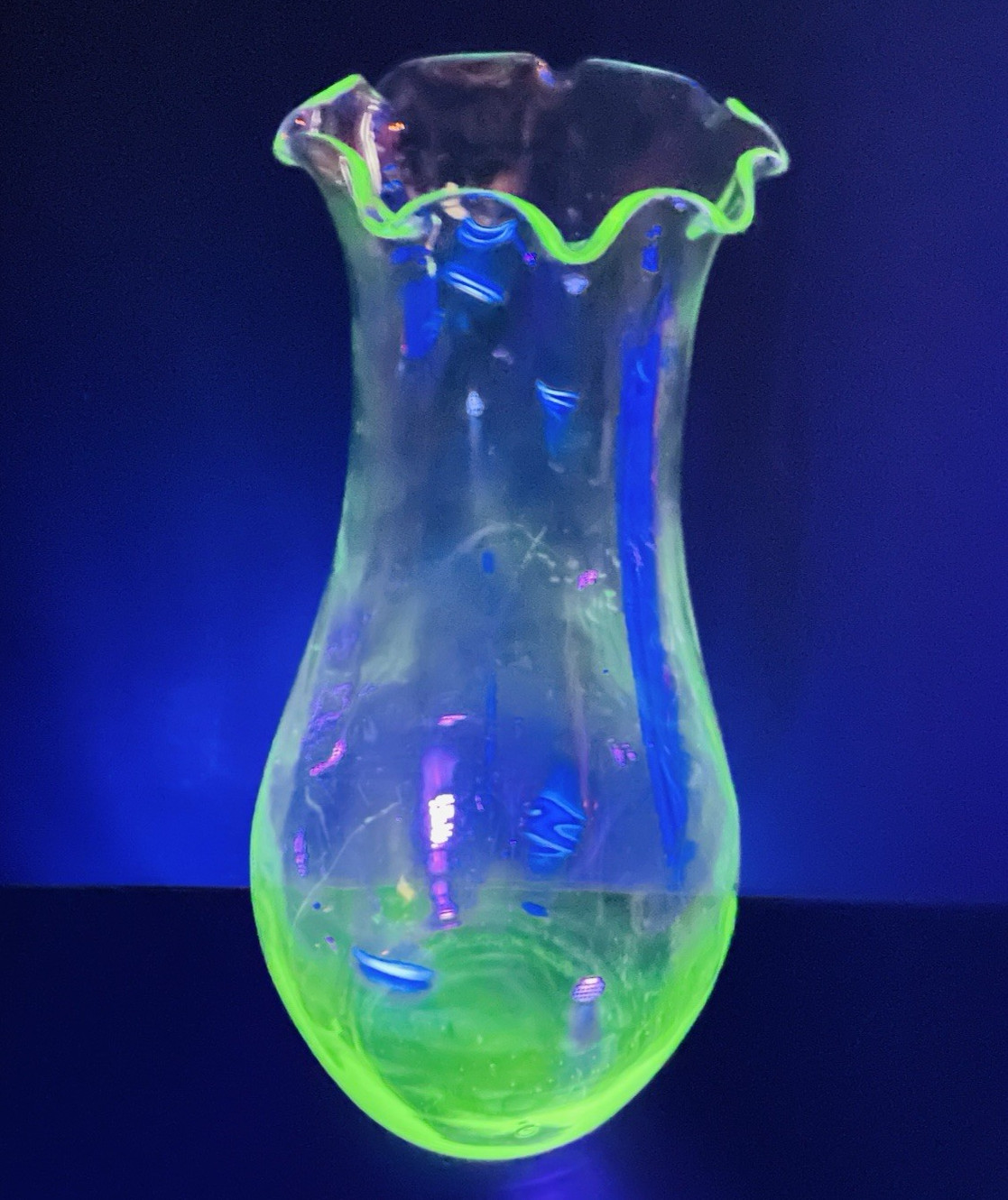 Vintage Green Uranium 12″Glass Vase Ruffled Rim faint vertical optic lines.
