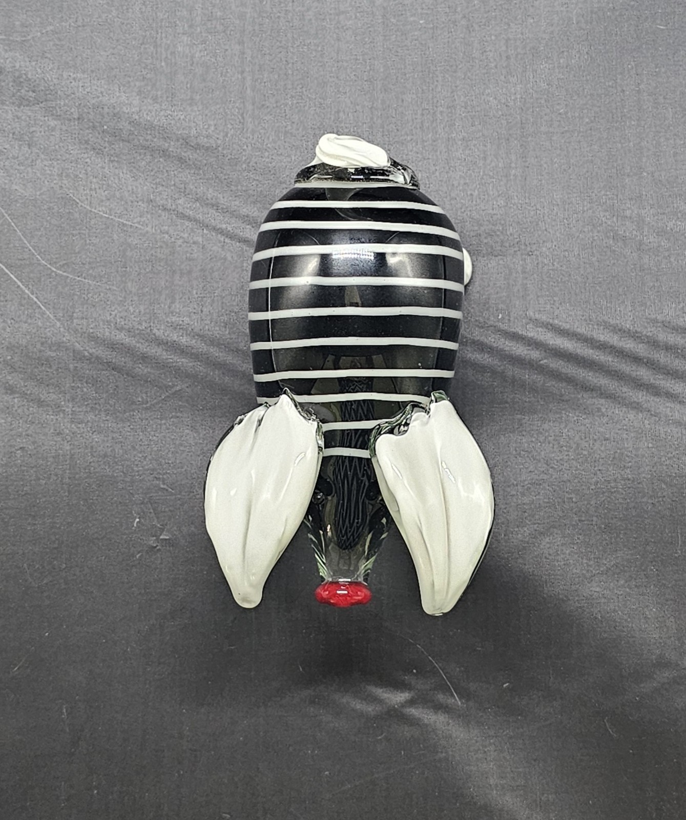 Hand-blown murano style striped art glass pig figurine w/red nose & white tusks.