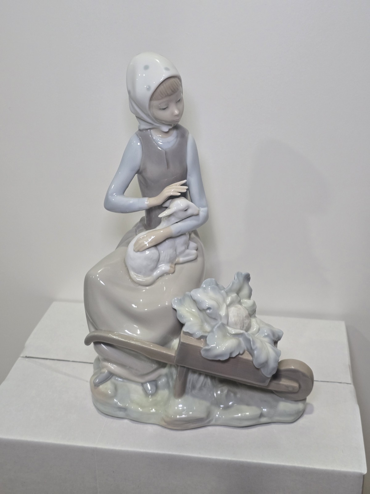 Vintage Lladró “Girl with Lamb & Wheelbarrow,” by Vicente Martínez in 1974.