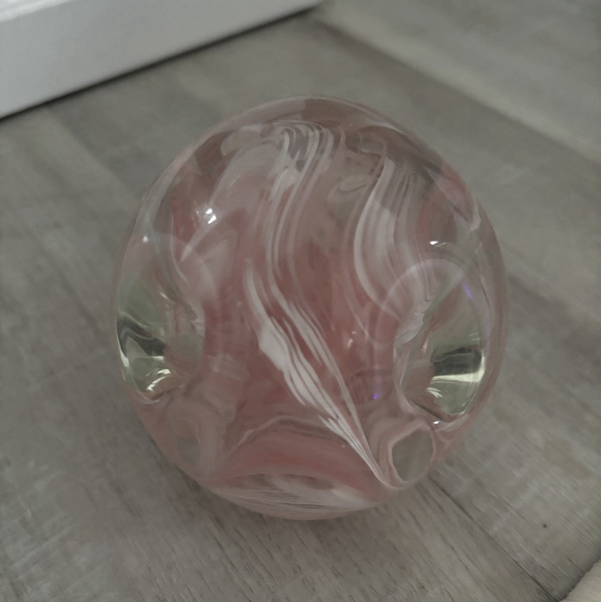 Pink and white swirl art glass paperweight