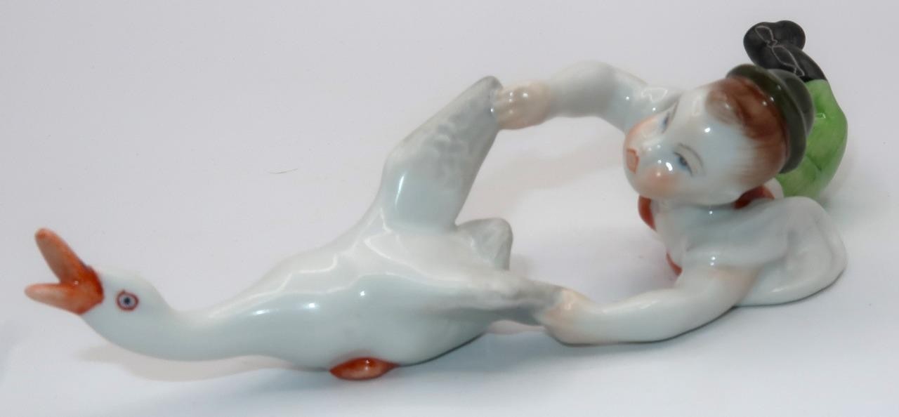 Herend, Hungary, 5231 Hand Painted Goose Dragging Boy Figurine, 7 3/8″ x 1 5/8″