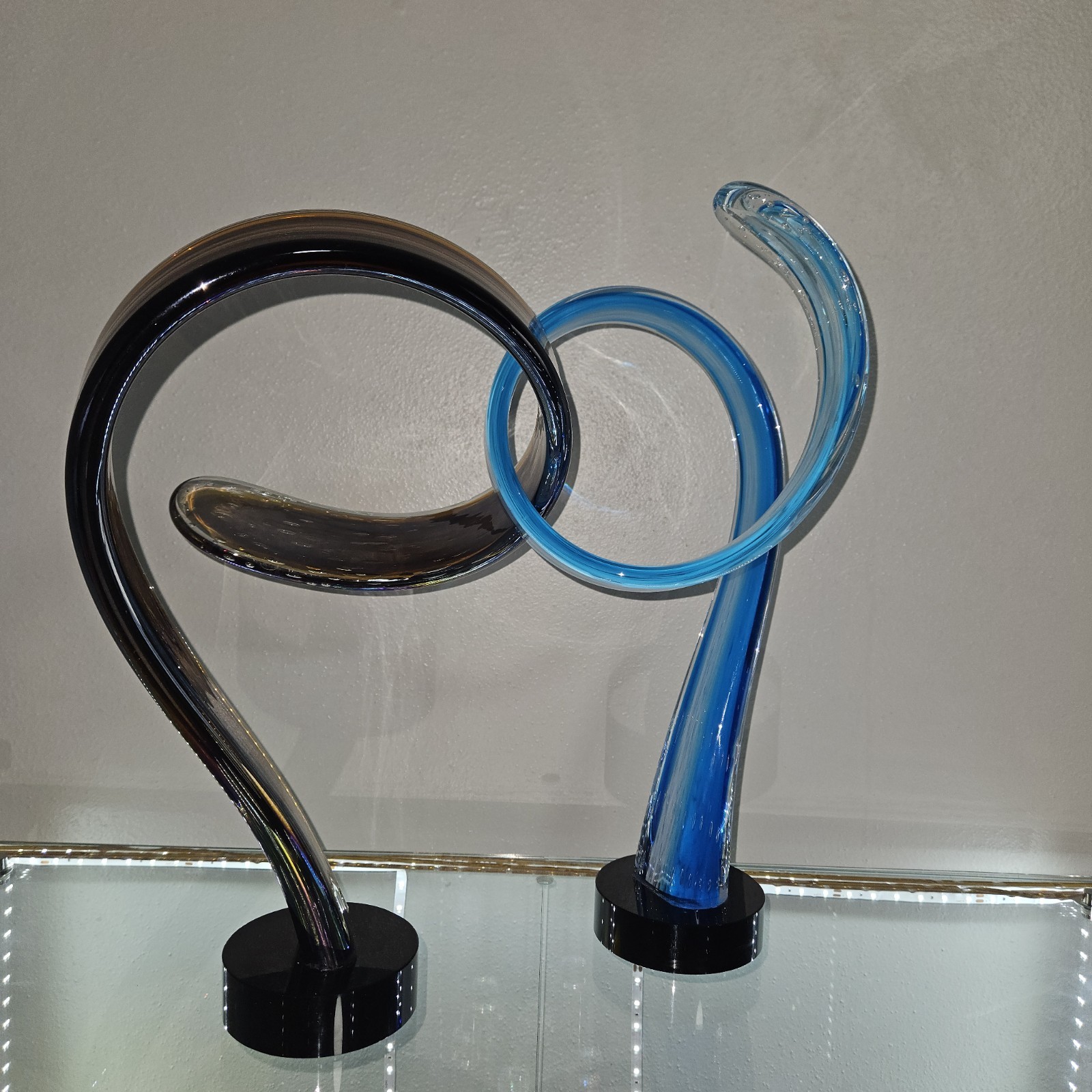 Intertwining glass sculpture