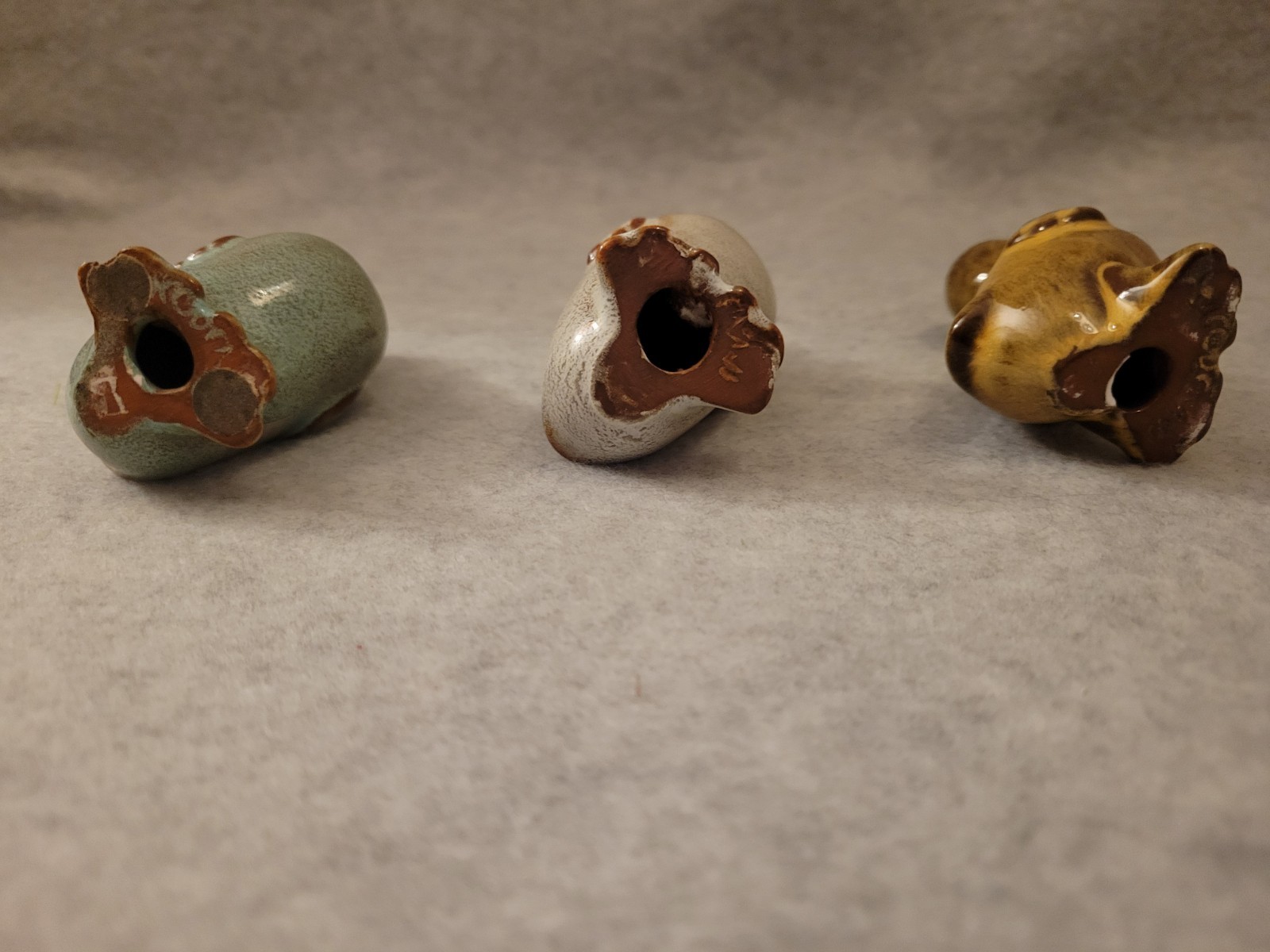 Nicodemus Art Pottery three (3) ferro stone varied color Walking Ducks