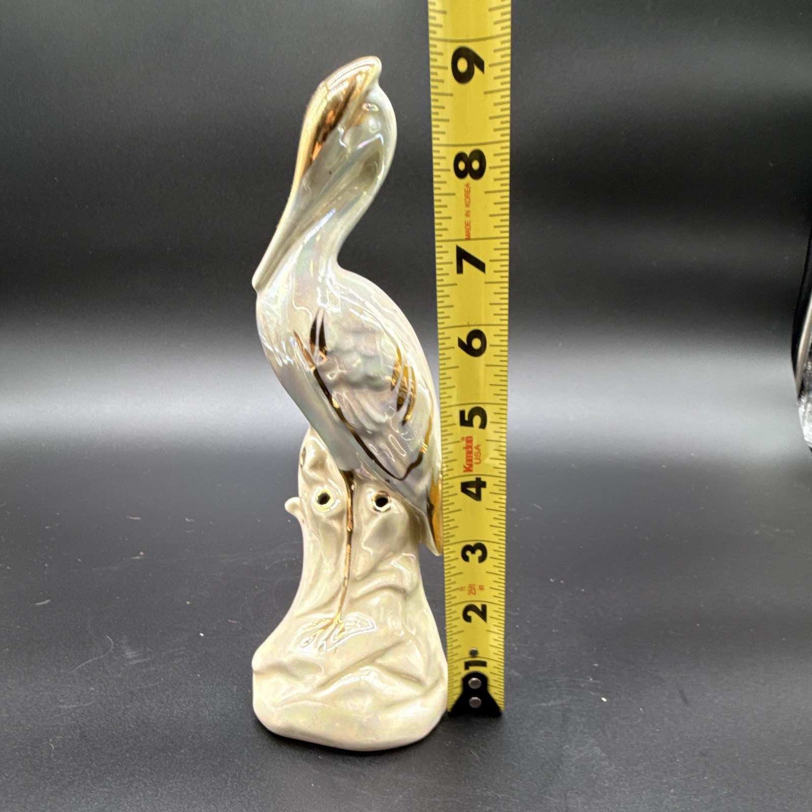 Iridescent white & gold ceramic pelican figurine, glossy finish, 8 in