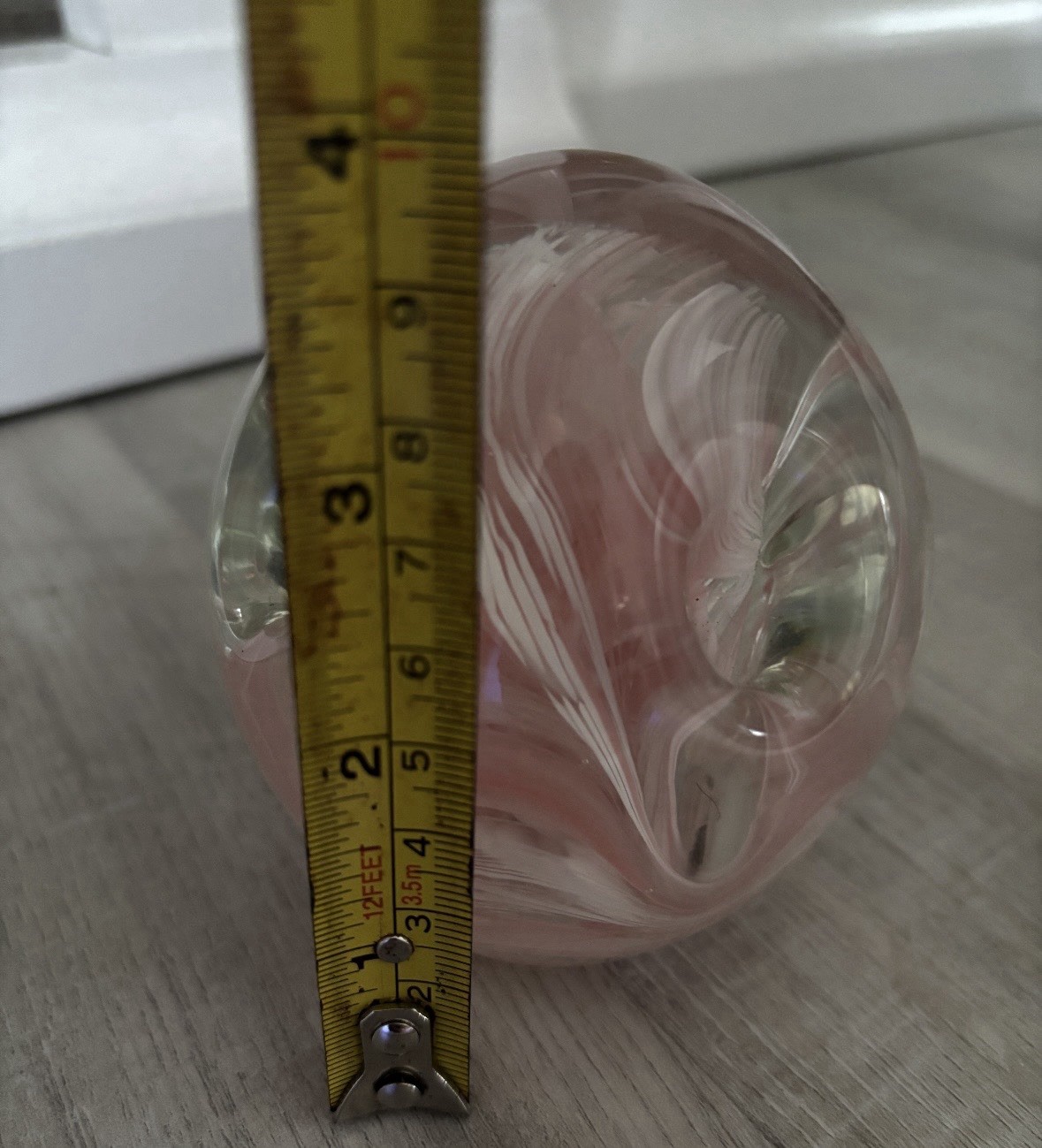 Pink and white swirl art glass paperweight