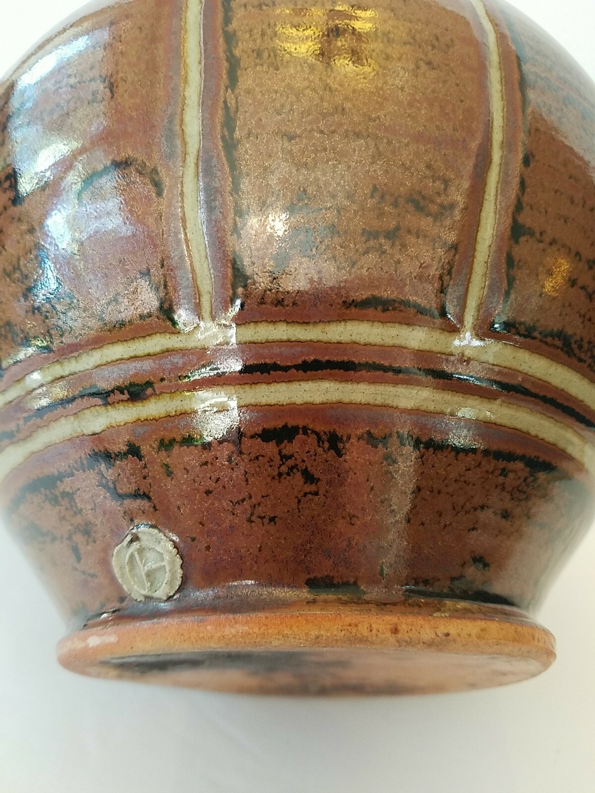 Vase clay studio handcrafted art pottery. The mark is like a seal on the side