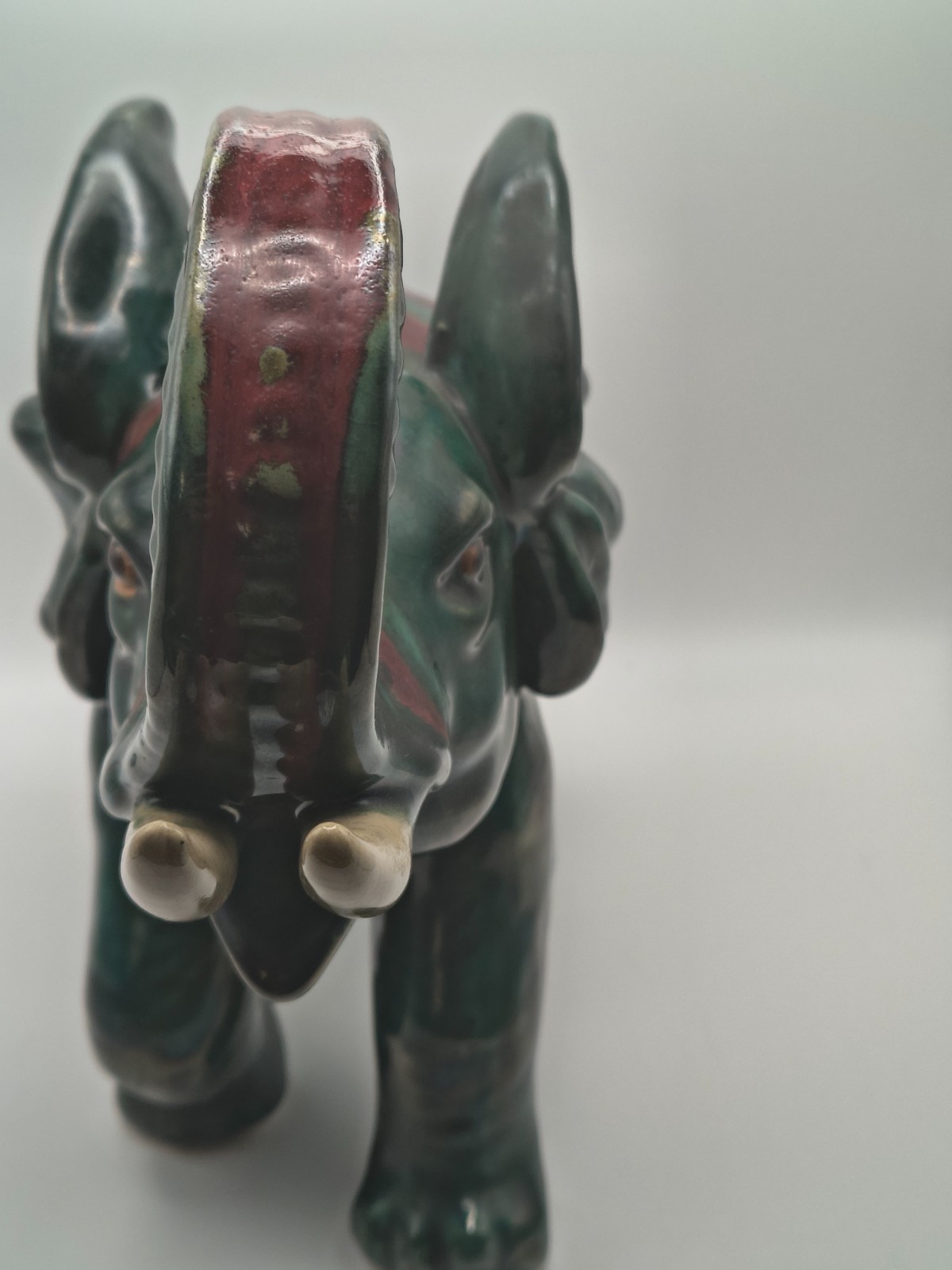 Vtg Elephant Pottery/Ceramic Green Red Glaze 10 inches tall by 11 inches wide