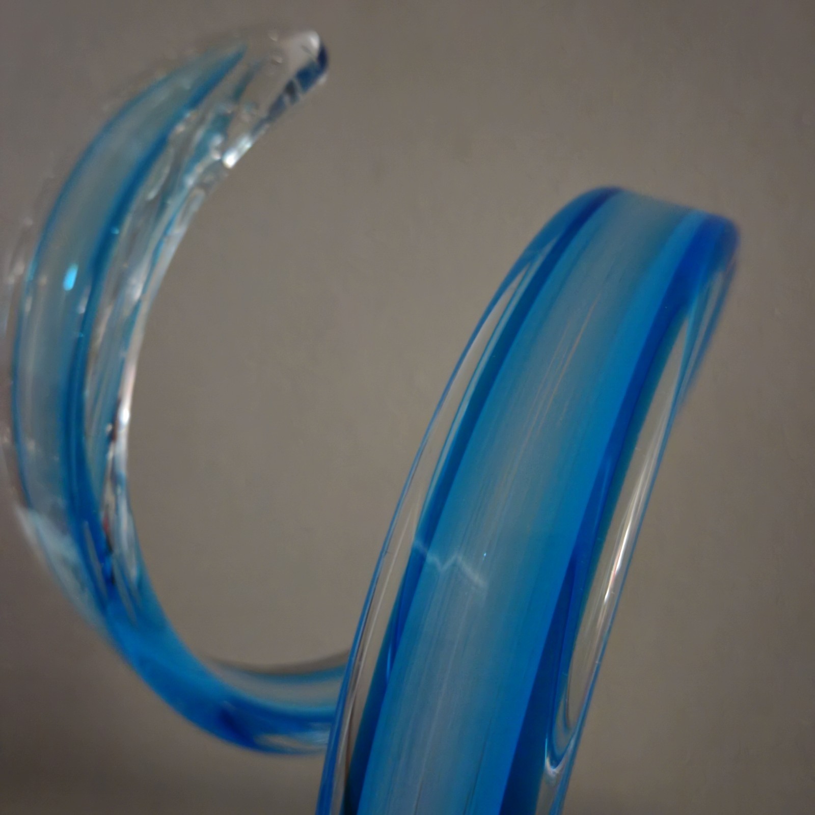 Intertwining glass sculpture