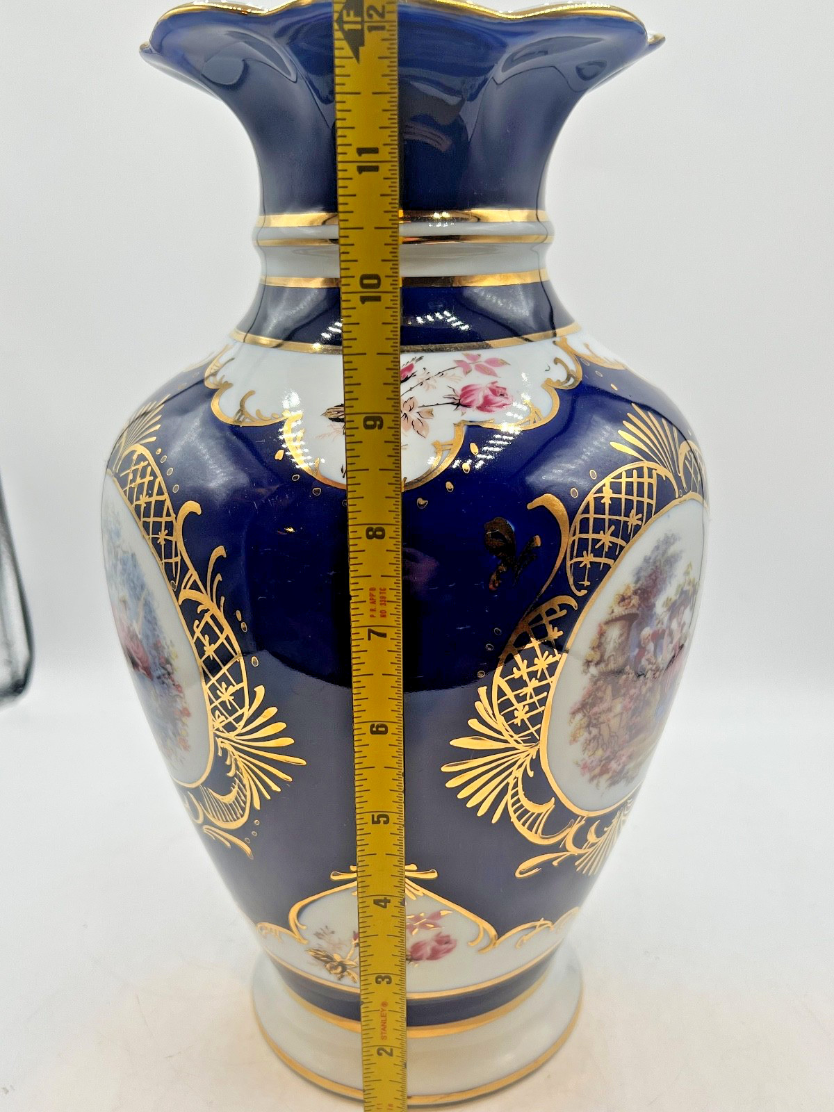 Fine Egyption porcelain vase with cobalt blue,gold,gilt, and pastoral scenes