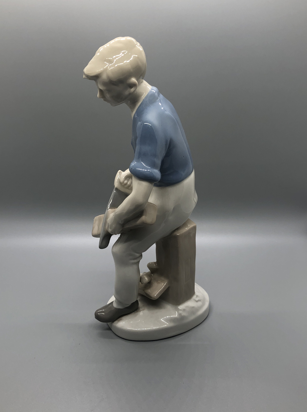 GDR Porcelain German Democratic Republic Boy Cutting Wood Figurine Vintage