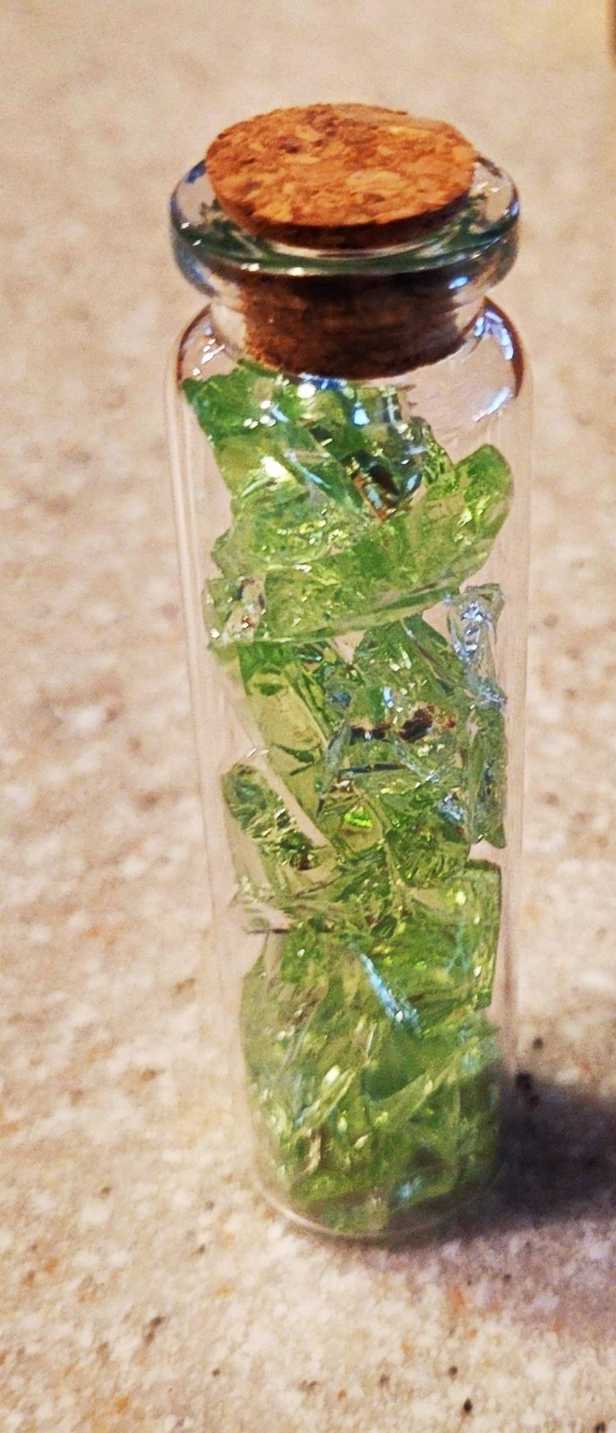 Uranium Glass Vial Of Crushed Vaseline Glows 3″ tall