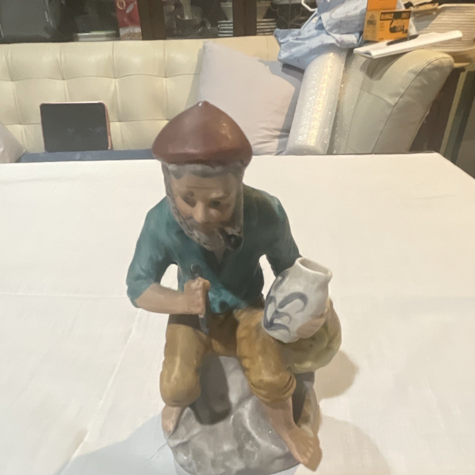 Ceramic Multicolor Glossy Decorative Figurine of Man with Jug People Theme
