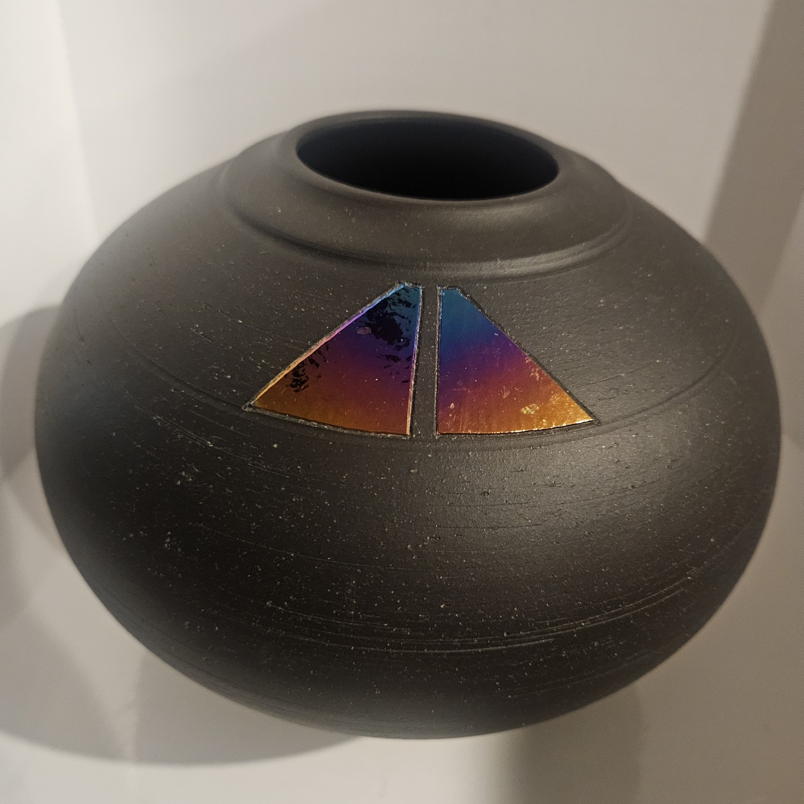 Vintage Artist Signed Black Matte Vase W/Multi-color Metallic Triangle Designs