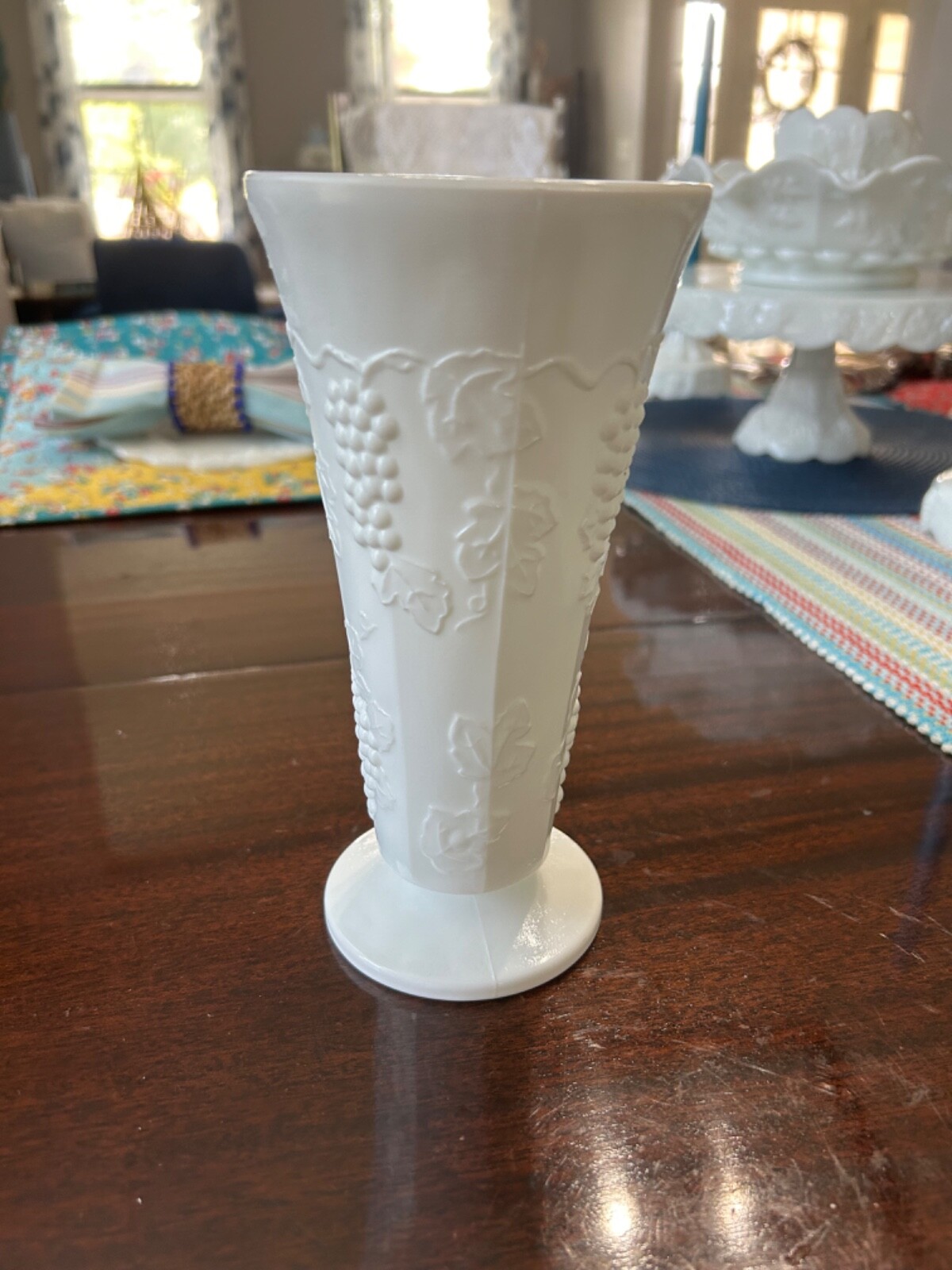 Vintage Indiana Glass Footed Milk Glass Vase, Grape & Leaf Pattern approx 8″