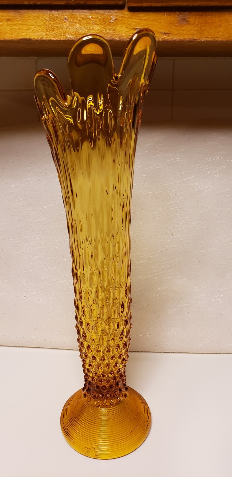 Hobnail Pattern Stretch Glass Vase. Amber Pedestal Bottom Glass Vase. 14″ High.