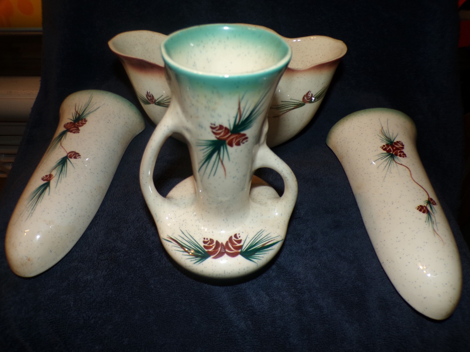 4 piece set of vintage rocky mountain pottery with hand painted pine cones