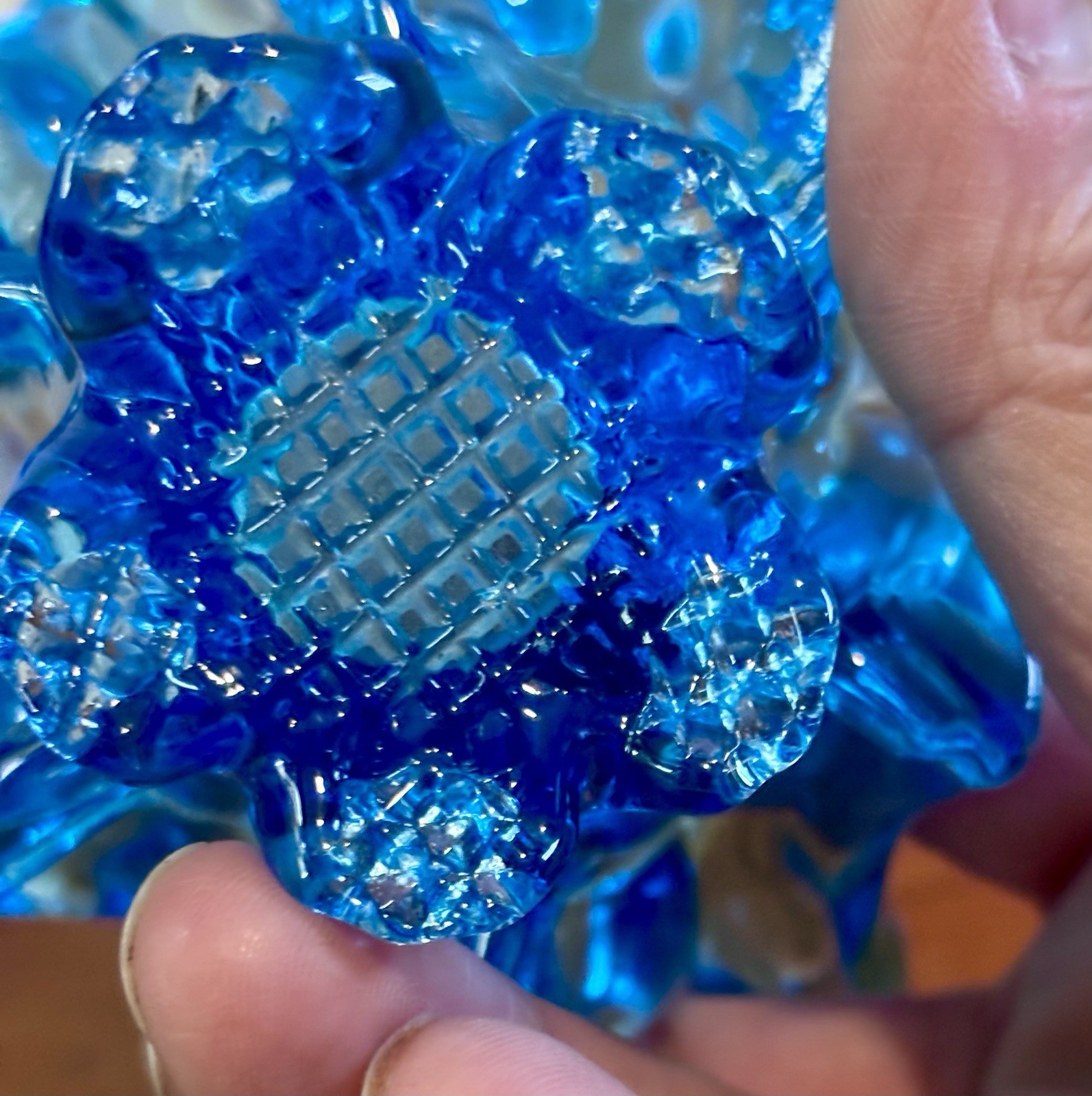 small vintage blue Chalet glass basket featuring a distinctive split handle
