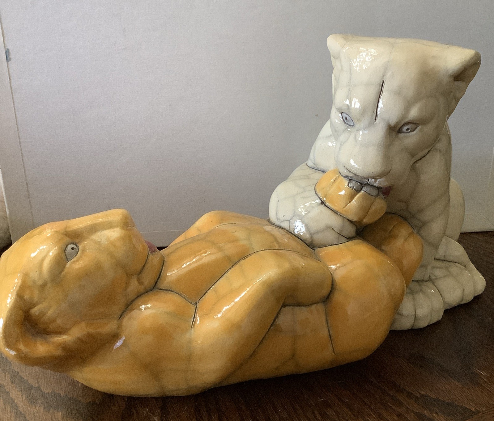 Raku lion cubs playing figurine/statue signed South Africa 10.5” L Yellow White