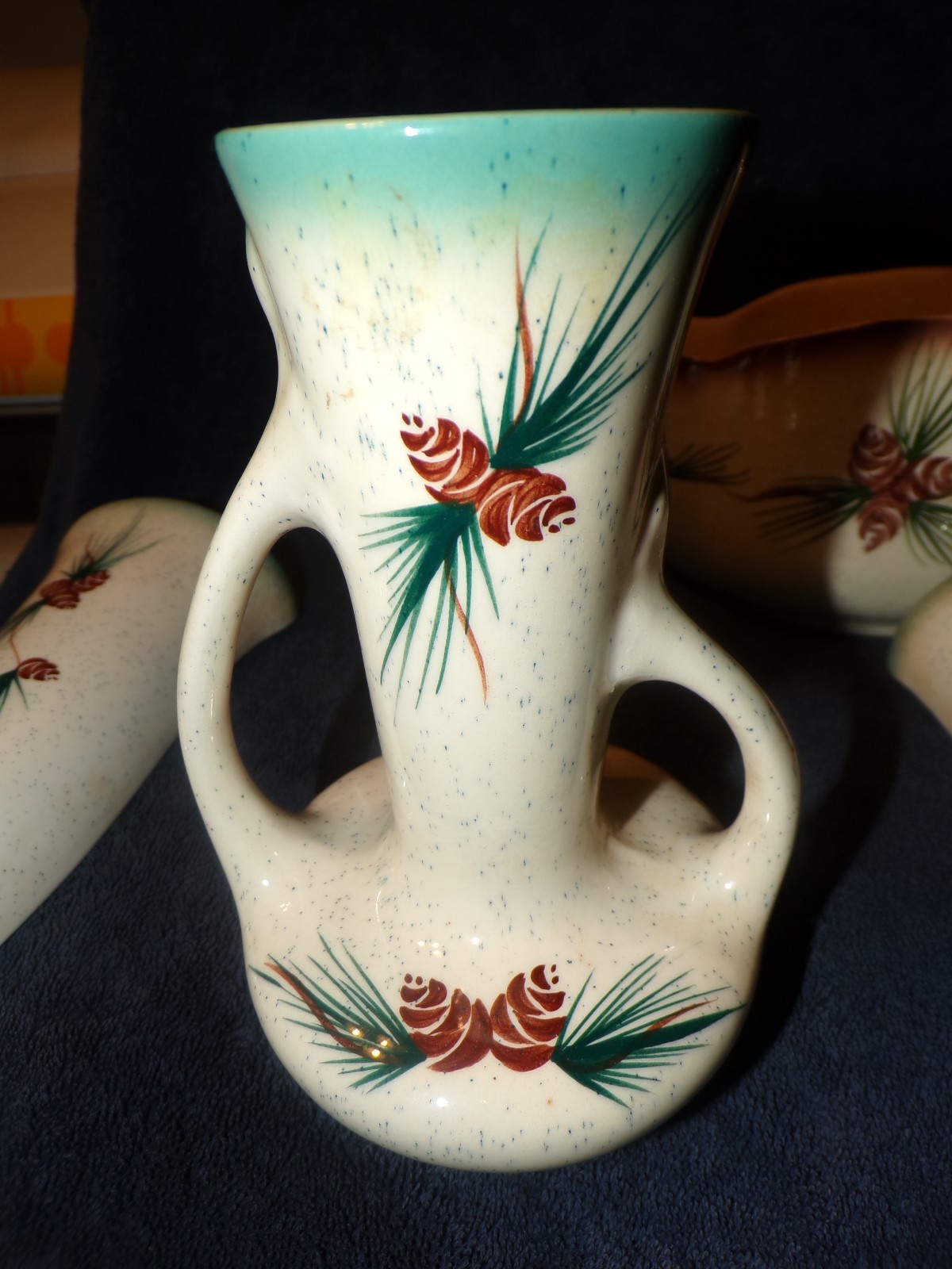 4 piece set of vintage rocky mountain pottery with hand painted pine cones