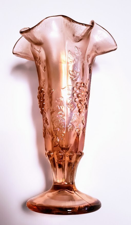 Fenton Pink Iridescent Glass Ruffled Vase Embossed Grapes Footed 7 5/8″