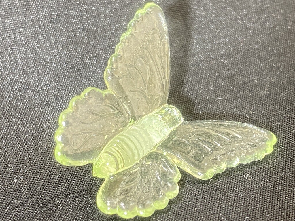 Green Vaseline glass butterfly insect monarch glow moth animal uranium selenium