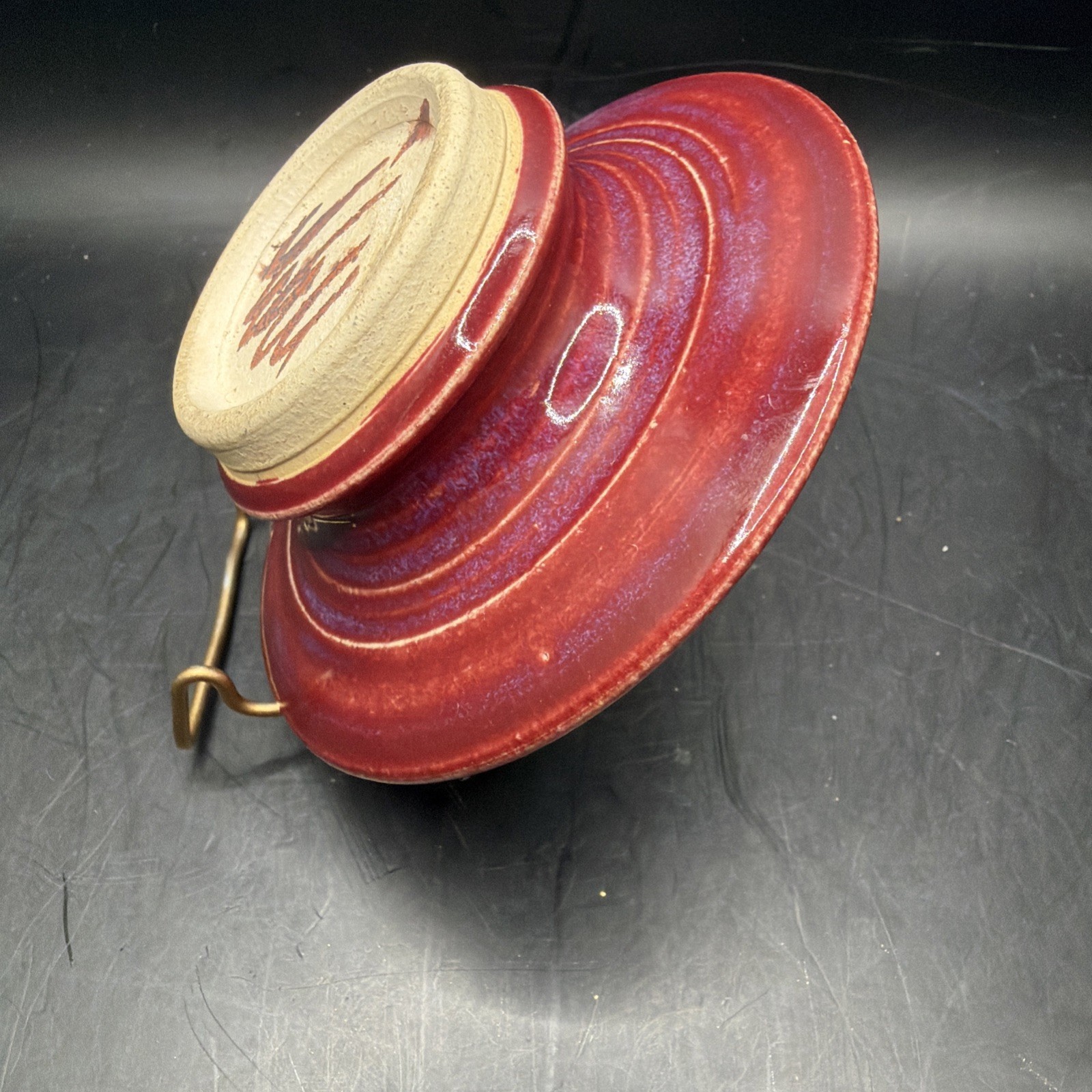 Signed hand made studio pottery Ox Blood candle holder.