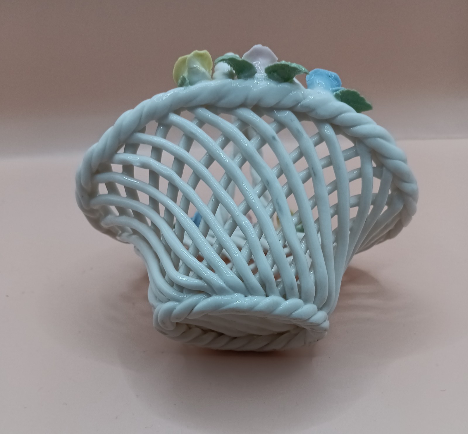 White Ceramic Woven Basket with Yellow, Pink, and Blue Rose Flowers