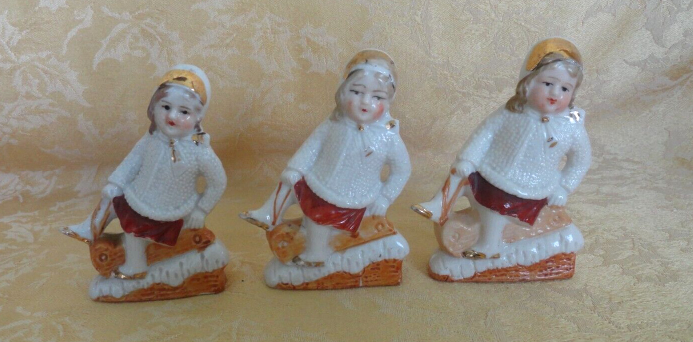 Set of 3 Antique Bisque Germany Figurines Girl On Sleigh 3.75″ Tall 1900’S