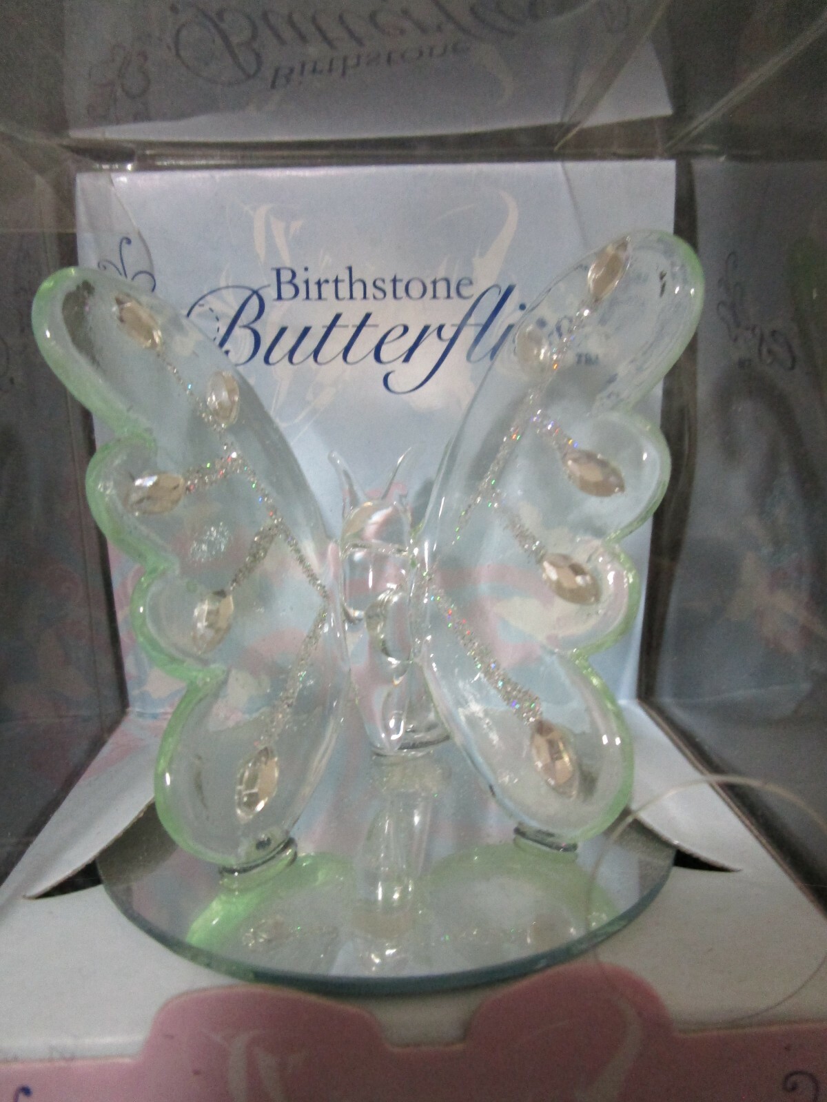 Novelty Inc. Blown Glass, H.F. Birthday Butterfly, PERIDOT, on Mirror Base