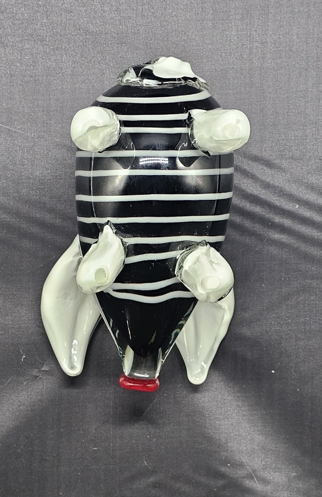 Hand-blown murano style striped art glass pig figurine w/red nose & white tusks.