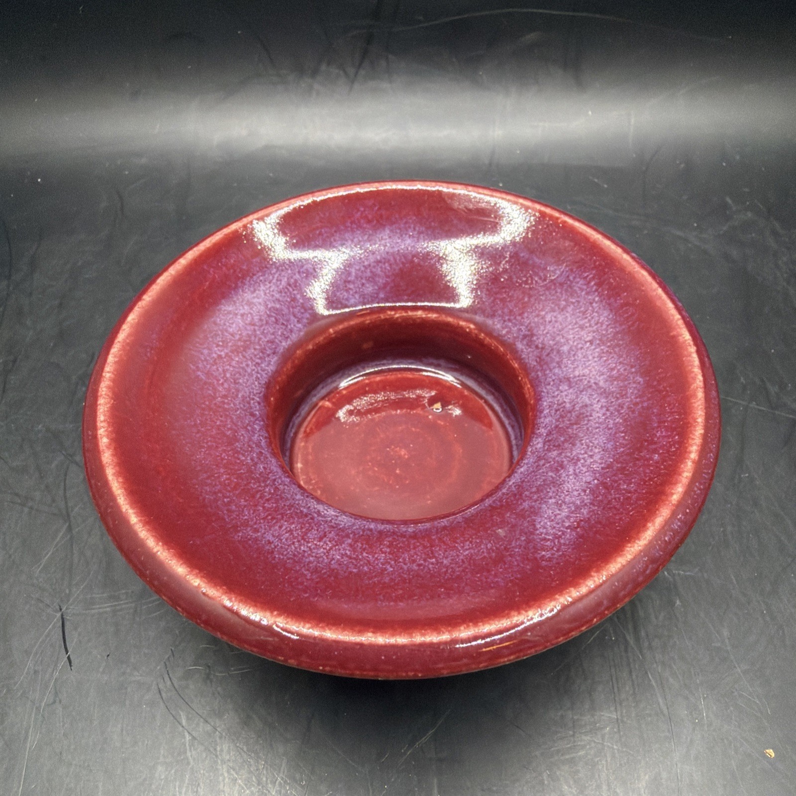 Signed hand made studio pottery Ox Blood candle holder.