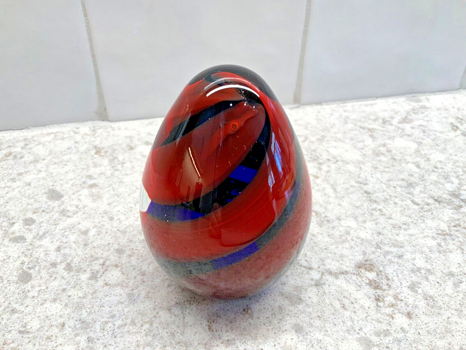 Medina Egg Shaped Paperweight Red With Black And Blue Spirals