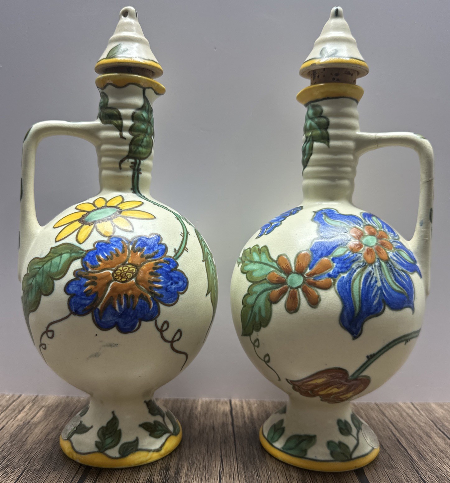 **ROYAL ZUID-HOLLAND GOUDA** VTG Pair 10.5” ‘Wilany’ Hand Painted Floral Ewers