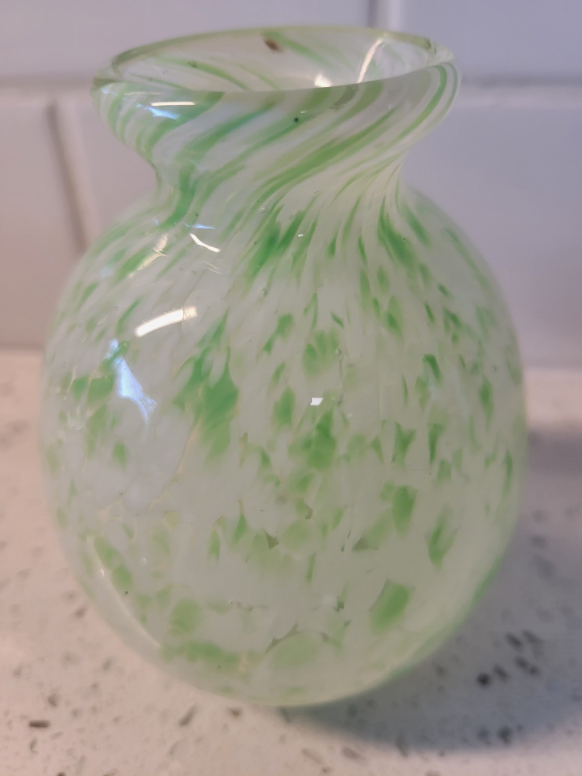 green and white splatter design art glass vase
