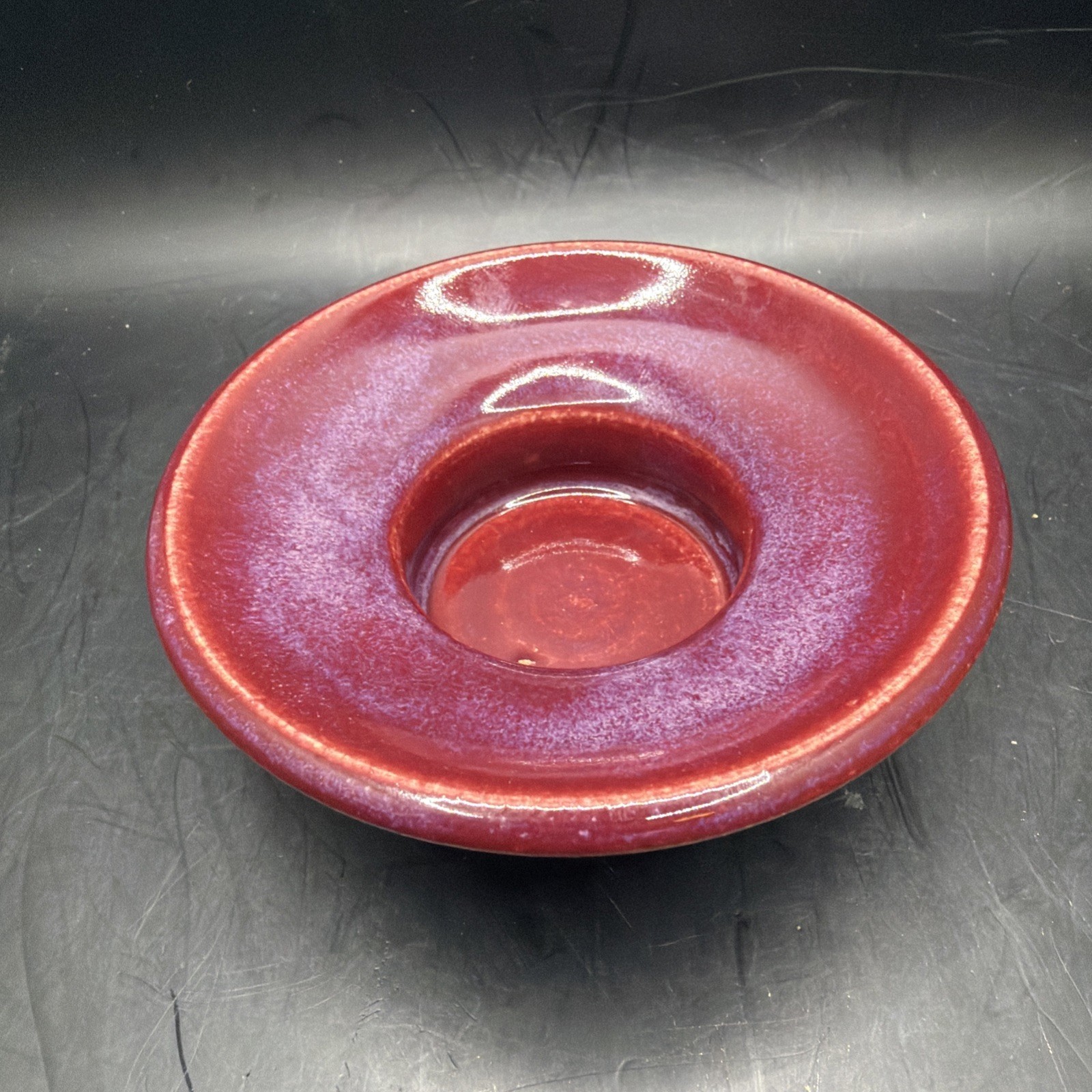 Signed hand made studio pottery Ox Blood candle holder.
