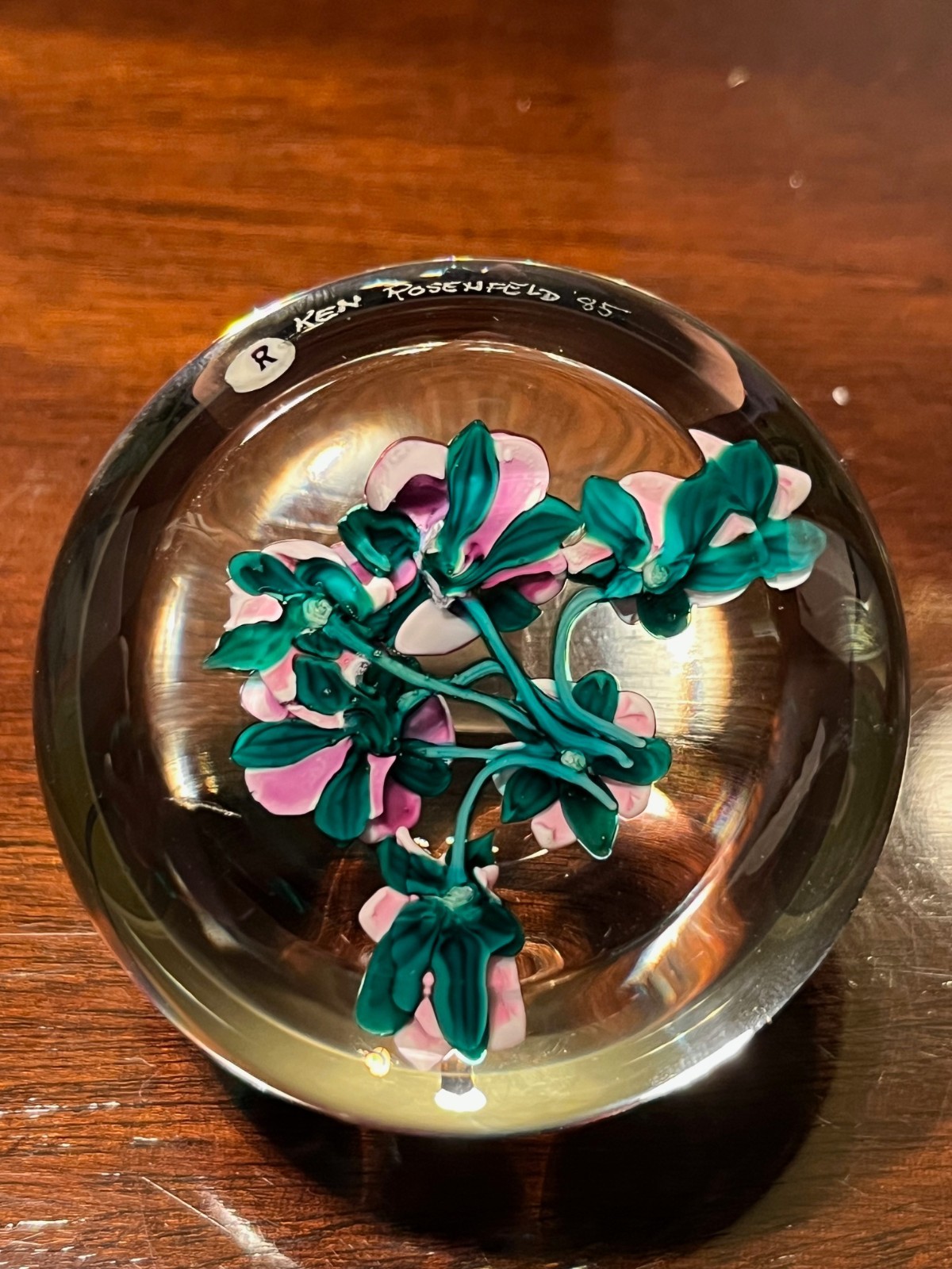 Early 1985 Ken Rosenfeld lampwork glass paperweight, pink and blue blossoms.