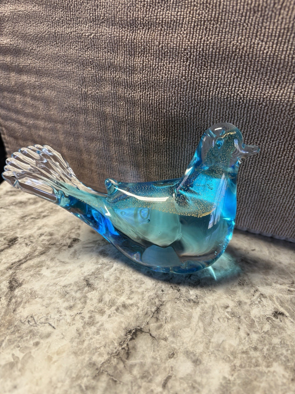 Clear and blue glass bird figure with gold flakes inside #B11